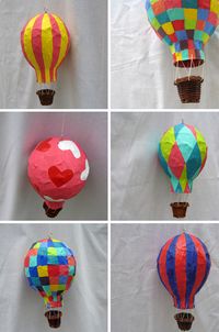Paper mache a balloon, pop the balloon, add string and a basket for spring class crafts. Could go great as a bulletin board theme (Kid's Soaring to New Heights in Reading...)