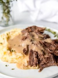 Making London Broil in the Crockpot yields a juicy, fork-tender roast beef swimming in a luscious, herby brown gravy, all with only 11 ingredients and 15 minutes of active prep. This cozy, comforting slow cooker classic is a cold-weather favorite!