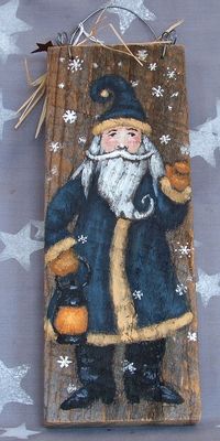 Snow falls on this charming Santa Claus, waving and carrying and old lantern. I just love his big mustache and the curled tip of his beard! This