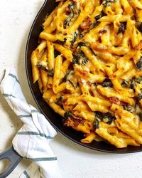 Cheesy Baked Pumpkin Pasta with Kale and Bacon. Sounds crazy decadent, but here’s the good news: each serving delivers a megadose of vitamins A & D, along with enough iron, calcium, and protein to make a major dent in daily needs. What?!!! It’s basically a multivitamin disguised as a more... #pasta #recipe #pumpkin #cheesy #vitaminrich #proteinrich #vitamina #vitamind
