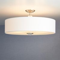 Built to hold six lights, the Bankloft Semi-Flush-Mount Ceiling Fixture will effectively illuminate any living or dining room. The fabric drum shade and frosted-glass bottom create a soft glow to keep your space well-lit and stylish. Featuring accents mad