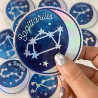 Zodiac Star Sign STICKERS (!!!) feature the Moon, Stars & Constellations in all zodiac signs! Holographic vinyl for magical & mystical vibes! We are literally starry eyed after gazing into these beauties! Perfect sticker size - 3" round. ♥ Aries♥ Aquarius♥ Cancer♥ Capricorn♥ Leo ♥ Libra♥ Gemini♥ Pisces♥ Sagittarius♥ Scorpio♥ Pisces♥ Taurus♥ Virgo………………………………….…………………………Details:♥ Measurements: 3" round♥ Materials: magical holographic vinyl♥ Packaging: unpackaged ♥ Ca