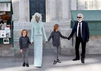 Fall 2018's couture show saw 18-year-old Adut Akech join Alek Wek as one of the rare black brides in Chanel's history, as well as join hands with not only Kroenig but also his younger bro, Jameson.