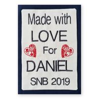 Create a custom embroidery design to stitch out as a quilt label. Download the free lesson handout on weallsew.com #quiltlabel #fusiblequiltlabel