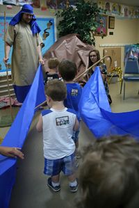 Red Sea - Crossing the sea on dry ground. Children take turns being Moses and rest of class follows through the "sea". All young classes.