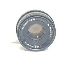 Excited to share this item from my #etsy shop: Yashica Lens ML 50mm 1:2 Zoom Lens Japan #cameralens #standard #filmcameralens #35mmcameralens