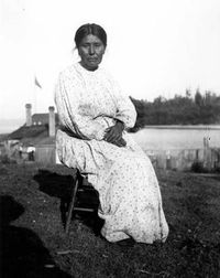 Suquamish/Duwamish woman known as Janey Davis, Old Man House, Port Madison Indian Reservation, Washington, July 4, 1904. :: American Indians of the Pacific Northwest -- Edmond Meany collection UW. Caption in album: Janey, daughter of Old Indian John of Lake Union, Old Man House.
