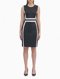 Artful and modern, this bold sleeveless dress features tri-colorblock styling. Crafted from a scuba-like stretch blend for maximum comfort with a crewneck, a back zip closure and a flowing a-line fit + flare silhouette.