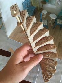 Partially constructed miniature spiral staircase, made by Amy Fletcher from mini amy blog.