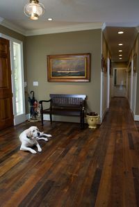Real, hard wood floors have such an organic and more authentic feeling versus wood laminate..
