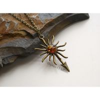 House Martell Sigil Necklace Faux Amber Season 4 Game of Thrones... (20 AUD) ❤ liked on Polyvore featuring jewelry, necklaces, amber pendant, amber jewellery, pendant necklace, metal necklace and long necklace