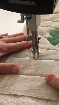It's time to do "The Twist" in part three of the Shamrock Table Runner Quilt Along! Learn how to free-motion quilt three motifs to use when creating your table runner on the blog at weallsew.com.