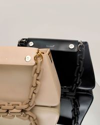 Give your bag a special charm with our chains. Making a statement even before entering the room, these chic accessories drape so beautifully over your favorite WEAT bag offering a fierce twist to your look and adding extra styling versatility. Discover the latest bag chains from WEAT and find your perfect one.