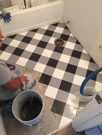When we moved in to our house, we knew that we wanted to renovate our downstairs bathroom. It wasn’t much to look at, with it’s vinyl floor, builder grade cabinet, and plain white walls…