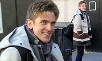 Dan Stevens looks windswept while wearing odd stripey coat on New York set of The Cobbler | Daily Mail Online