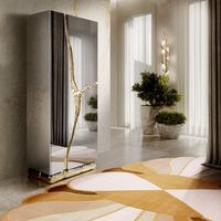 A sleek modern contemporary hallway with the stunning MERMAID RUG. This piece is truly the focal point of this hallway thanks to its original irregular oval shape and bright colors. This rug is a wonderful item to create an inviting atmosphere in your home.