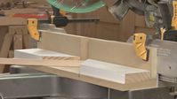 Make a simple jig from scrap wood to make safe easy cuts at angles greater than 45 degrees with your compound miter saw or chop saw.