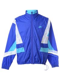 Colour block blue 1990s Nike jacket with full lining and pockets.Sleeve Length: 25 inchBust: 47 inchWaist: 41 inchLength: 26 inch