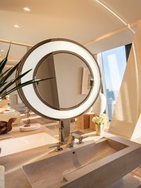 If you’re looking to get your fix of extraordinary homes, step inside this massive residence that occupies an entire floor at one of Manhattan's newest skyscrapers. Its primary bath is a large, spa-like sanctuary with heated limestone slab floors and automated mirrors