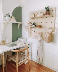 Hellllloooooo PEG BOARD! Pegboard styling, home organization, home decor, home storage, home office, workspace, office decor, office design, fun work space, color blocking, color block, green paint, ikea desk, office desk, desk chair, shelf decor, home design, interior design, home design ideas, boho, modern