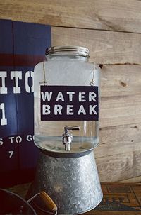 Make sure guests don’t forget to hydrate by providing a big cooler of water decorated with a stenciled “water break” sign.