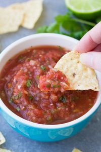 The Best Homemade Salsa Recipe is quick and easy to make in just minutes! This homemade restaurant style salsa is fresh, flavorful and healthy. This easy salsa recipe uses fire roasted tomatoes and is so much better than store-bought salsa. It's fast and easy to make in your blender or food processor!