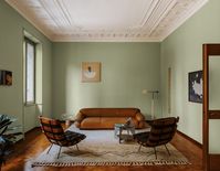 Old meets new in a city-centre abode. Mixing historical styles within a home is never an easy feat. Tasked with breathing life into a turn-of-the-century apartment, the owner opted to crash old and new into one another head-on. Original parquet wooden floor and intricately molded ceilings renovated with Absolute Paint in the living room contrast cleverly with the apartment’s more radical features, like a monolithic stainless steel cabinet set and blue Cementoresina floors in the kitchen.