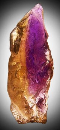 Ametrine is a mix of Amethyst & Citrine, found only in the Anahi Mine located in Bolivia. It is thought to be a very powerful money stone, aids in meditation, relieves tension, disperses negativity & helps to eliminate prejudice. It is said to bring serenity & calm, give strength & mental stability, & to enhance one's ability to assimilate new