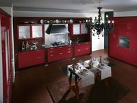 Baccarat. A thrilling metropolitan interior. Wax Red gloss lacquered and Dark Oak wood. For a very striking composition that transforms the kitchen into a temple of taste, expressing style and personality.