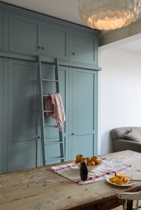 Bespoke Shaker cupboards in 'Trinity Blue' with a beautiful ladder to match