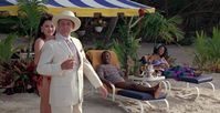 Here in this image, we see, left ➡️ right, Gladys (Donna Palmer), Coleman (Denholm Elliott), Billy Ray Valentine (Eddie Murphy) & Monica (Shelly Chee Chee Hall), whilst they celebrate their Legally Allowed win on the New York Stock Market against the old Duke Brothers. The $394 million profit, theoretically, would've been split four ways, with Ophelia (Curtis), Winthorpe (Ackroyd), Coleman (Elliott) & Valentine (Murphy) each receiving $98 500 000 at 1980s valuations.