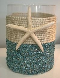toothbrush holder...beachy bathroom?? could use my green and yellow toothbrush holder and soap dispenser and just glue stuff onto them to cover up the colors
