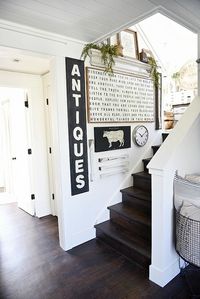 DIY stairway gallery wall - A great blog for DIY farmhouse decor & inspiration for a farmhouse style staircase gallery wall. A must pin for future gallery walls for any room of your home!
