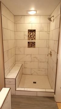 Grouted 12 x 24 tile with marble look, Schluter edging on all corners