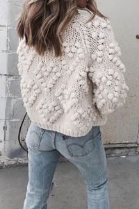Pull à motifs pompons