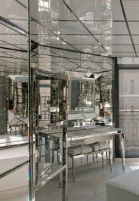 Make a bold statement in your powder room with a play of mirrors all over. You can combine this with silver trimmings such as towel rods, lighting fixtures and vanity. Image courtesy, Le Royal Monceau, Raffles Paris