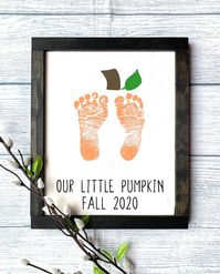 "Halloween Gift - Fall Wooden Sign - DIY Handprint Art Create a piece of special home decor for the fall! WHAT YOU GET: -9.5\" x 11.5\" wooden sign with the \"Our Little Pumpkin Fall 2020\" lettering -3 paint pots - orange, brown, and green -Paint brush DIRECTIONS: -This is a DIY kit that comes blank for you to decorate your own sign. You will need to paint and press your child's feet onto the wooden sign (we recommend practicing on paper a few times before). ABOUT THE SIGN: -9.5\" x 11.5\" wood