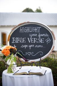 Katie + Brooks had several guest books including one where they had guests sign their favorite Bible verse. Photo by Alisha Crossley Photography