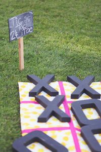 Your guests will love playing tic-tac-toe at your outdoor wedding | Brides.com
