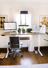Take a tour into my modern sewing studio. I have switched from a classic sewing cabinet to a standing desk – it's been a great improvement on my stamina!