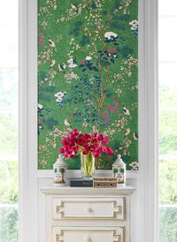 Airy and artistic, Katsura showcases gracious linework with fine vertical branches, blossoms, and birds.