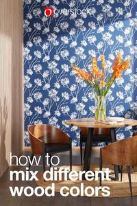 Blending wood furniture with floors and cabinets can be tricky. Explore Overstock's guide to learn about undertones, and how to style contrasting wood colors. #guide #woodcolors #homedecor #overstock