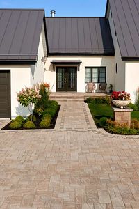 This walkway design is inspired by our Eva paver. Chiseled and sculpted, Eva entertains its onlookers with its unique slate/flagstone surface texture. Not only does Eva’s appearance bring a new perspective to traditional-looking patio pavers at a budget-friendly price, but the pavement is also de-icing salt resistant, withstands harsh climates and comes with a transferable lifetime warranty. Check out our website to shop the look!
