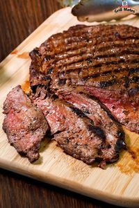 Grilled Flank Steak with Montreal Seasoning + Charred Tomato Salsa = The ultimate grilled dinner. A robust marinade of coarse black pepper, garlic and dill adds a zesty boldness to this juicy steak recipe, rounded out by the smoky charred tomato salsa.