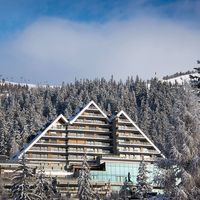 Many hoteliers, faced with the task of designing a hotel in an Alpine setting as awe-inspiring as Switzerland’s Crans-Montana, would opt for something safe and unremarkable, and convince themselves they’re letting the landscape take center stage. Crans Ambassador, on the other hand, takes a more active approach; this building aims to complement the majesty of the Alps, not cower before it, and thanks to its rakish angles and its monumental modern spaces, you’d have to judge it a success.