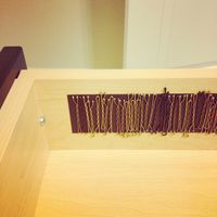 Bobby pins on a magnetic strip in a drawer- need to do this!