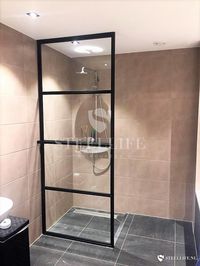 Douchewand met staal en glas