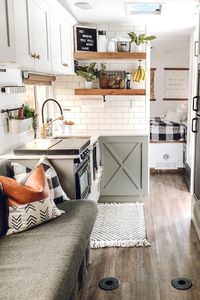 You’ll wanna go glamping in this Modern Farmhouse Style Toy Hauler! Featuring @FoxandTimber on MountainModernLife.com #rvrenovation #toyhauler #campermakeover #modernfarmhouse #modernfarmhousetyle #camperremodel #designvibes #happycamper #rvinteriordesign #tinyhometour #glamping