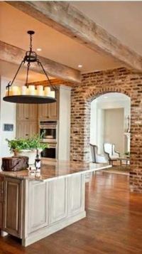 Brick in kitchen and beams. Love!..could extend on into living room with beams by eddie