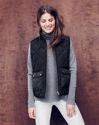 FALL OUTFIT: white pants, turtle neck shirt, and a vest.. Great look.